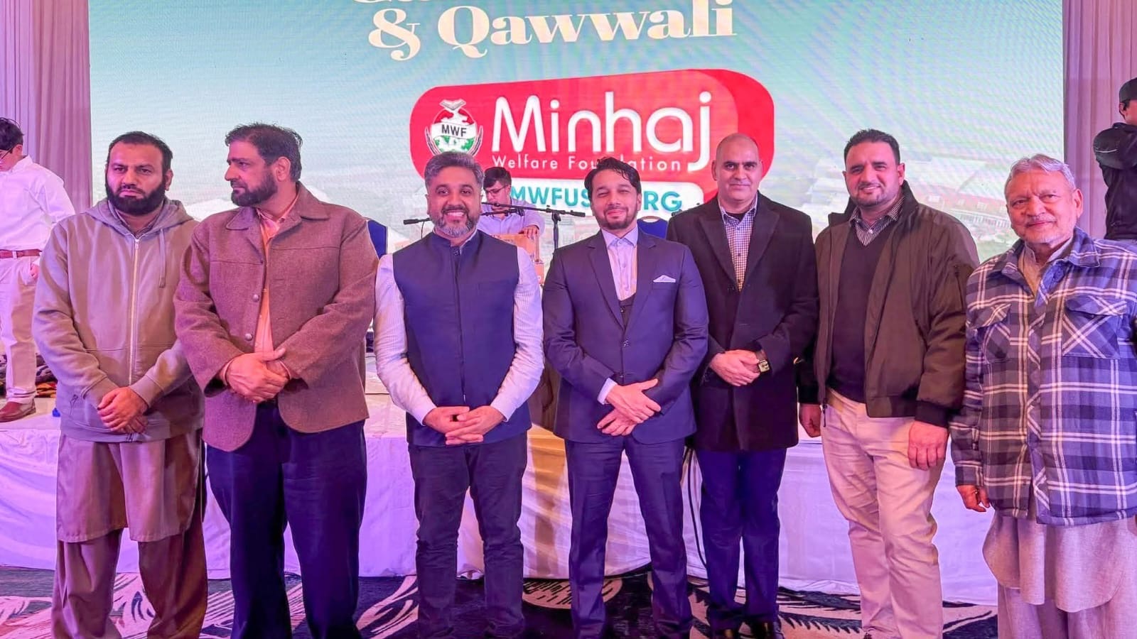 Syed Najam with community leaders during an orphan-care fundraising gathering in the United States